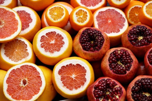 Sliced grapefruit, oranges and pomegranites