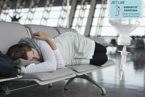 Jet Lag - woman sleeping on bench at airport